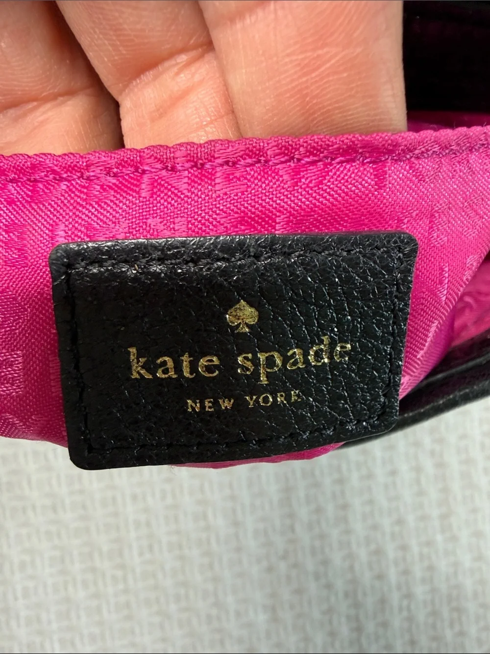Kate Spade black quilted leather crossbody bag with gold chain and hardware